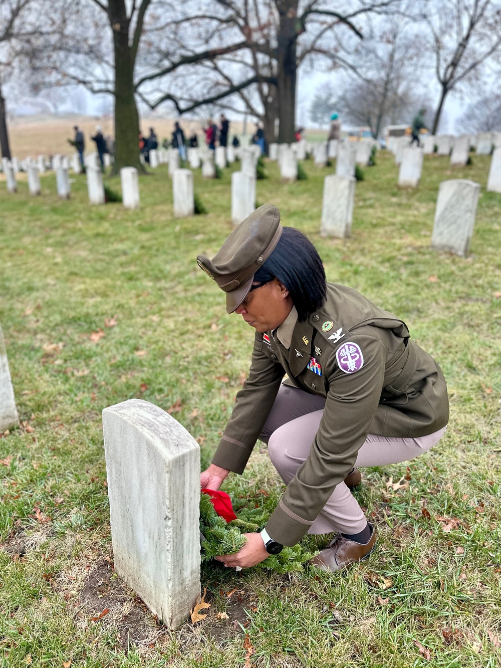 Service Members honor the fallen during Wreaths Across America Ceremony