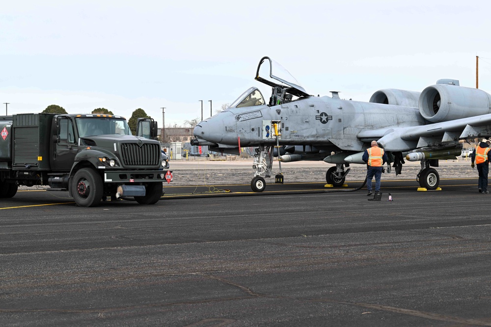 An A-10 Thunderbolt II rests mid-journey for refueling