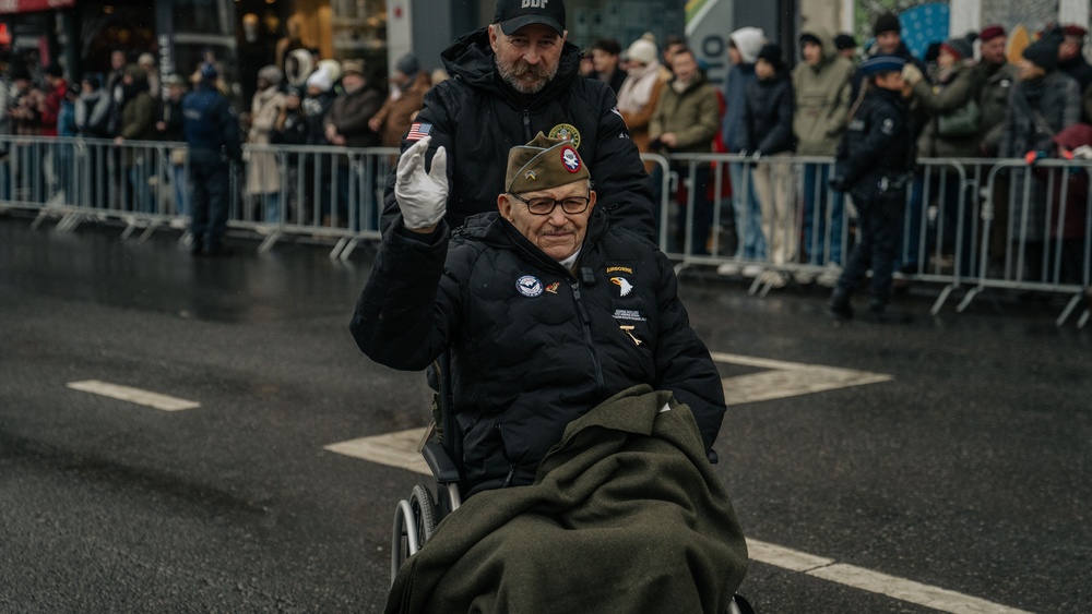 Screaming Eagle Soldiers March In NUTS! Parade With World War II Veterans