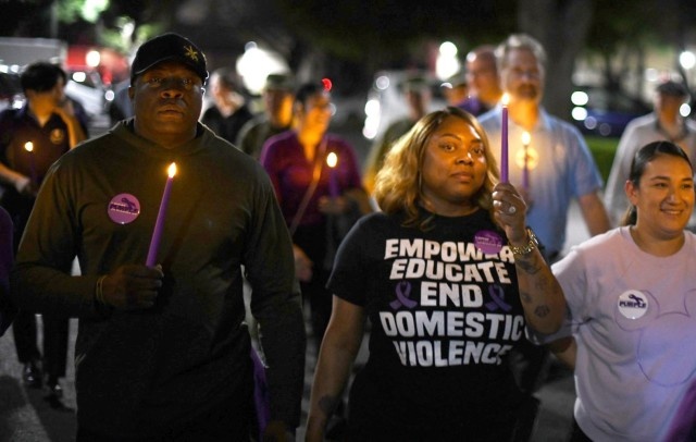 Camp Zama community shines light on domestic violence awareness with candlelight vigil walk