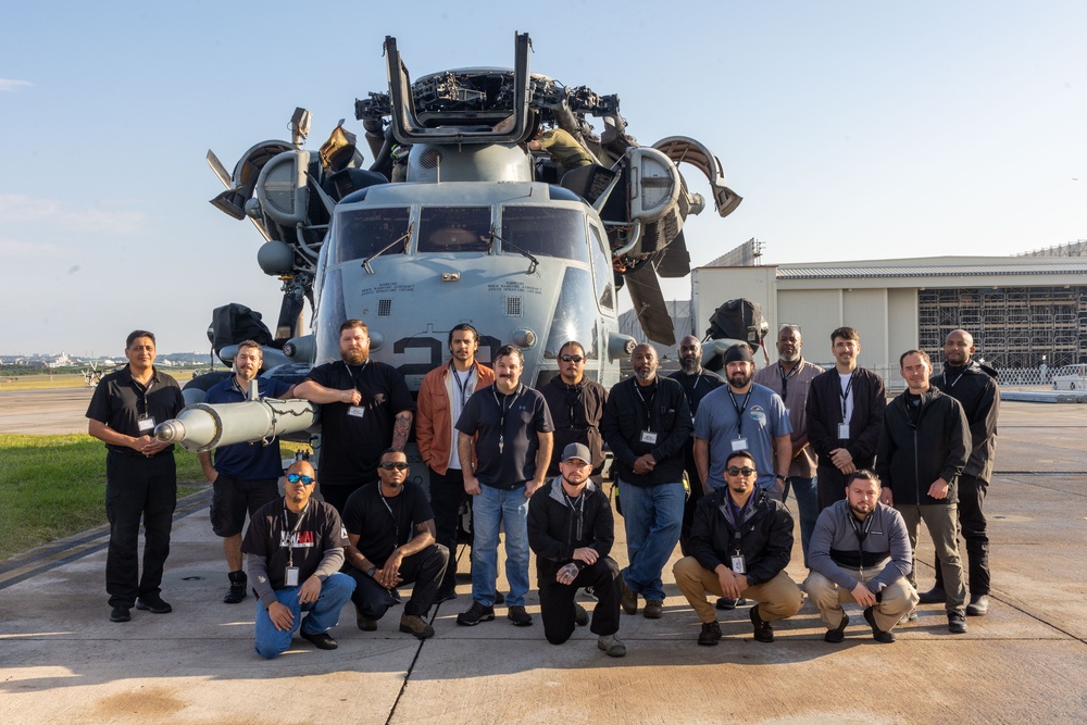 Marines, contractors clean MAG-36 aircraft