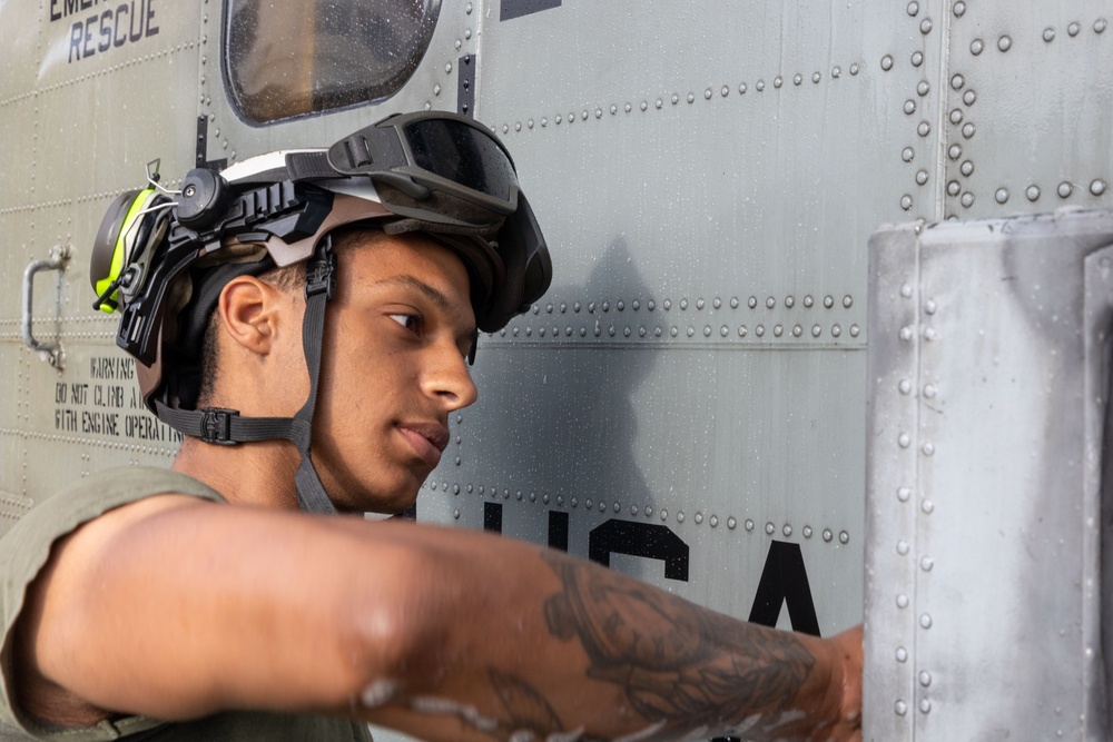 Marines, contractors clean MAG-36 aircraft