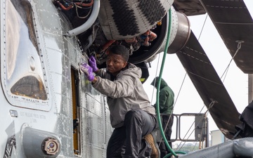 Marines, contractors clean MAG-36 aircraft