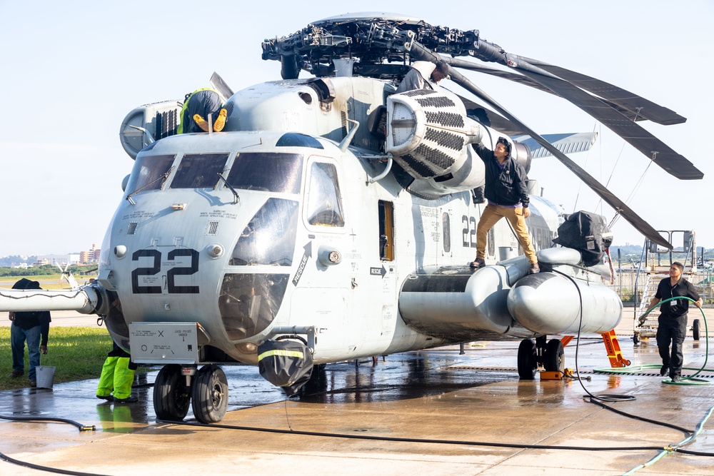 Marines, contractors clean MAG-36 aircraft