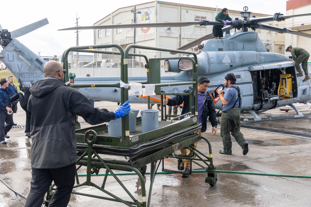 Marines, contractors clean MAG-36 aircraft