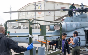 Marines, contractors clean MAG-36 aircraft