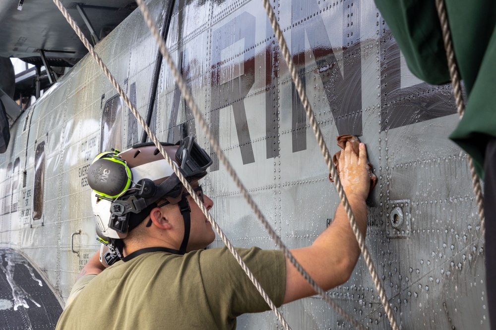 Marines, contractors clean MAG-36 aircraft