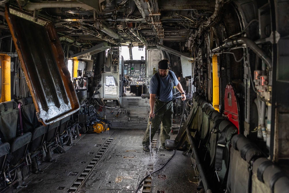 Marines, contractors clean MAG-36 aircraft