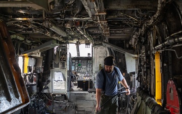 Marines, contractors clean MAG-36 aircraft