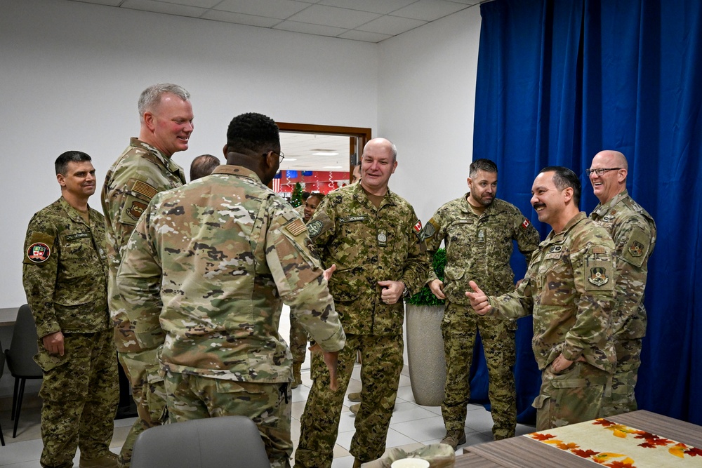 Canadian Armed Forces Chief Warrant Officer shares lunch with USAF, CAF leaders