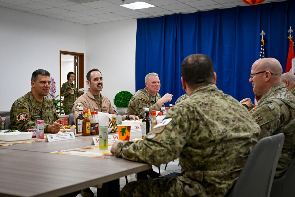 Canadian Armed Forces Chief Warrant Officer shares lunch with USAF, CAF leaders