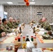 Canadian Armed Forces Chief Warrant Officer shares lunch with USAF, CAF leaders
