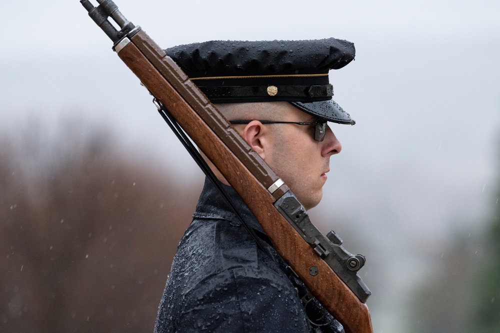 Tomb Guard Walks the Mat in the Rain