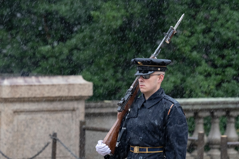 Tomb Guard Walks the Mat in the Rain