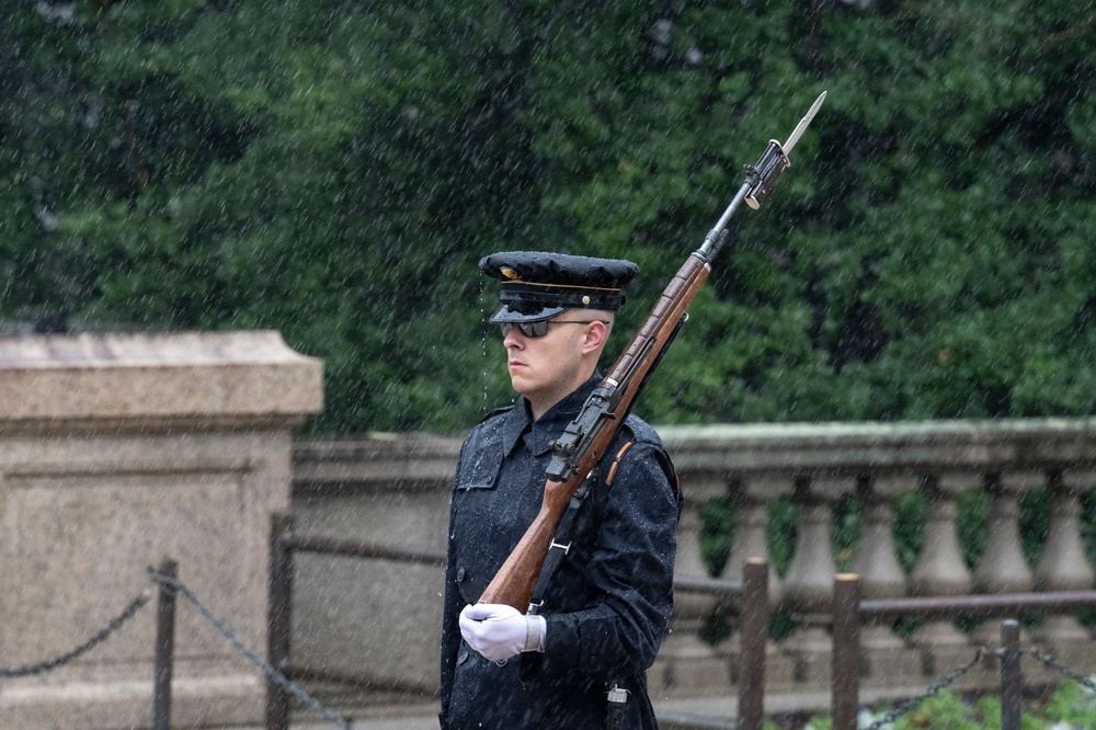 Tomb Guard Walks the Mat in the Rain