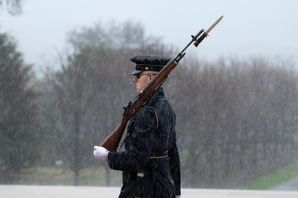 Tomb Guard Walks the Mat in the Rain