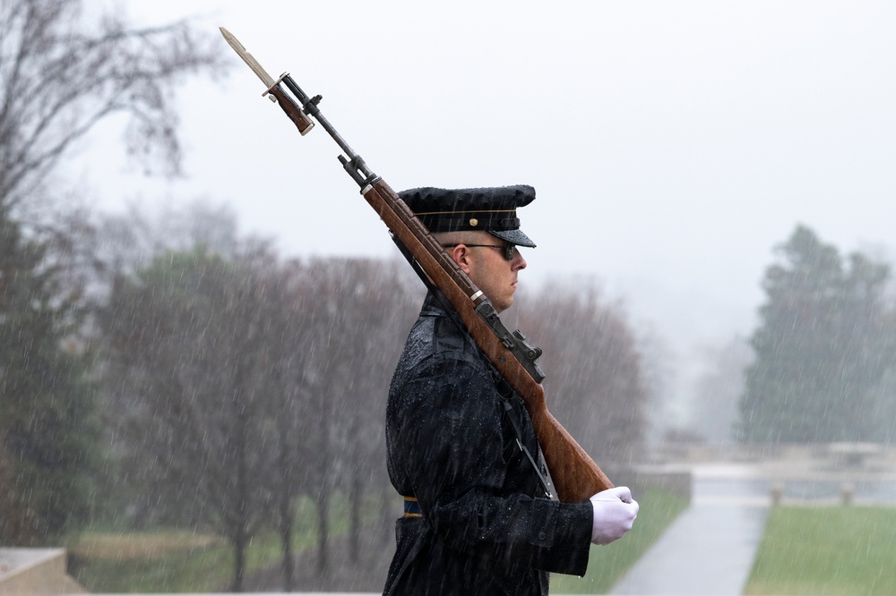 Tomb Guard Walks the Mat in the Rain