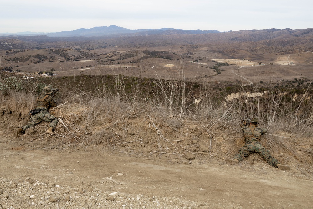 U.S. Marines with 2nd Bn., 1st Marines conduct reconnaissance patrol during combat readiness evaluation