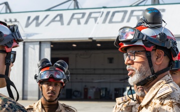 U.S. Marines with HMLA-167 welcome Royal Bahraini Air Force personnel