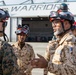 U.S. Marines with HMLA-167 welcome Royal Bahraini Air Force personnel