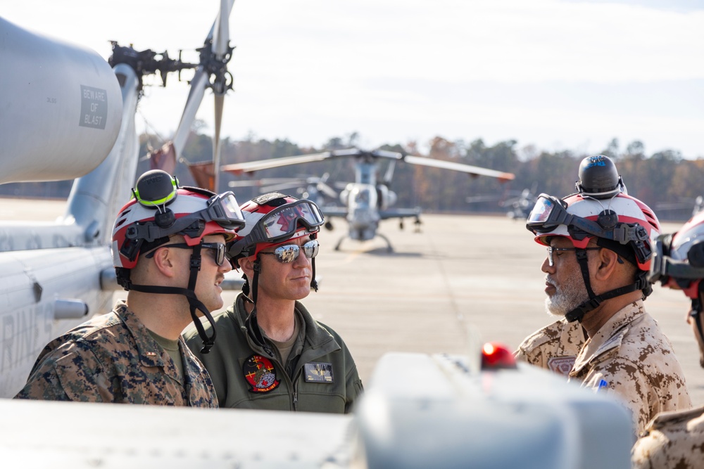 U.S. Marines with HMLA-167 welcome Royal Bahraini Air Force personnel