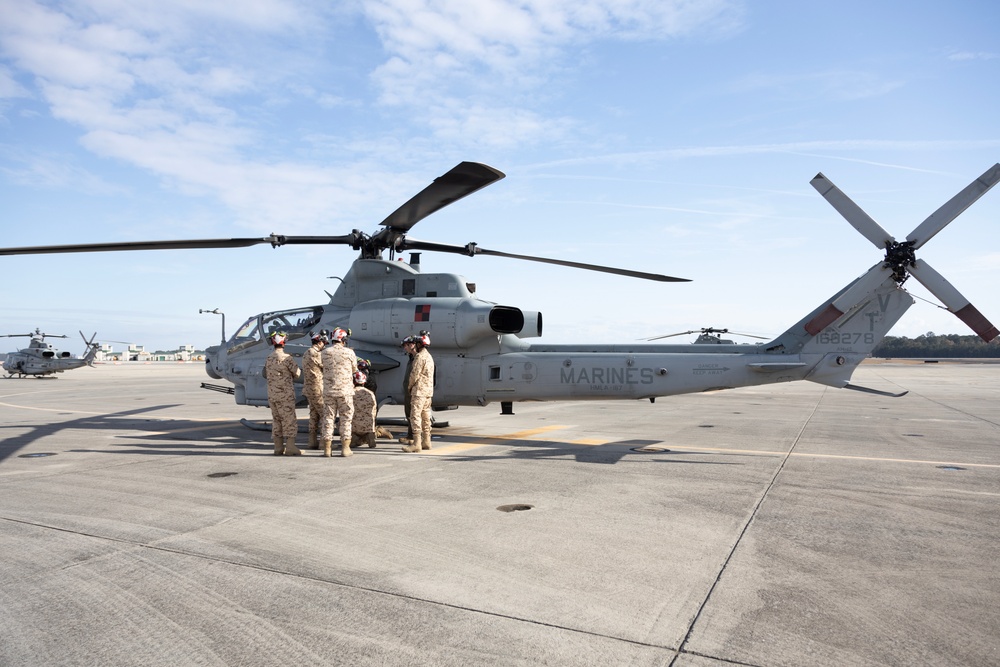 U.S. Marines with HMLA-167 welcome Royal Bahraini Air Force personnel