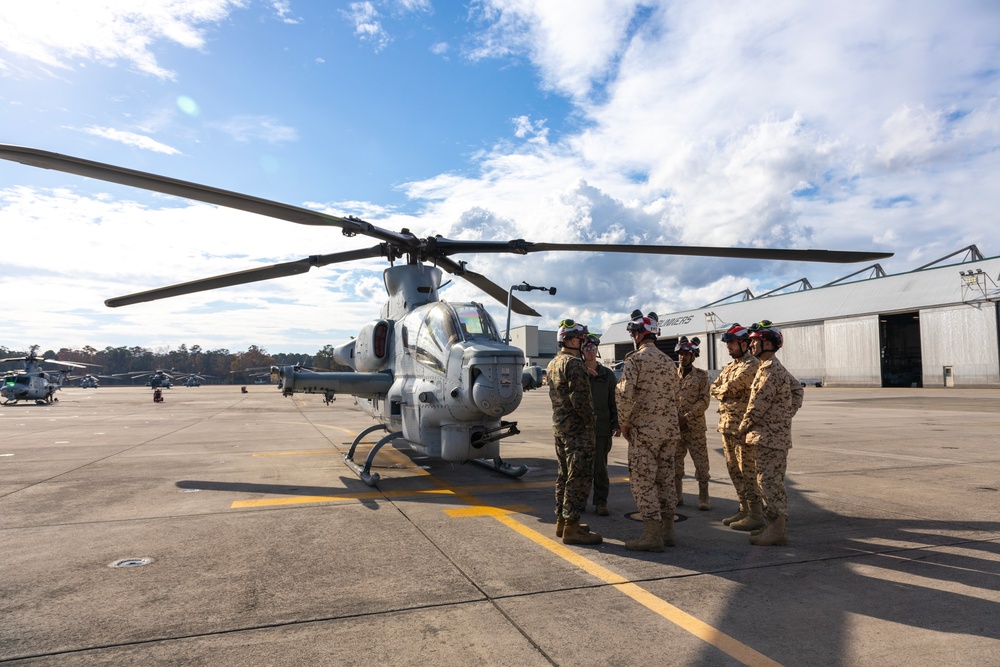 U.S. Marines with HMLA-167 welcome Royal Bahraini Air Force personnel