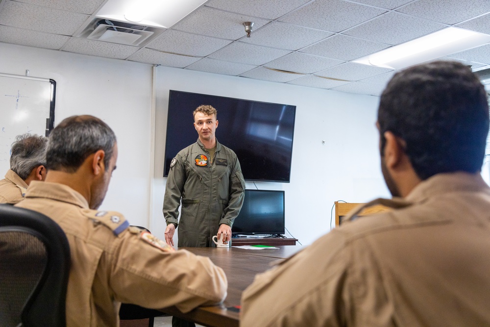 U.S. Marines with HMLA-167 welcome Royal Bahraini Air Force personnel