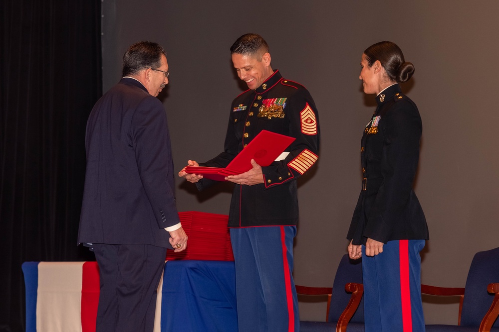 Former Marine Security Guards are awarded by the Sergeant Major of the Marine Corps