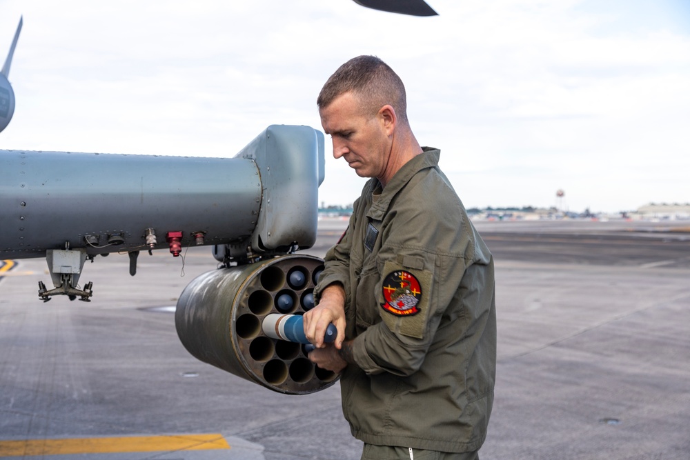 U.S. Marines with HMLA-167 welcome Royal Bahraini Air Force personnel