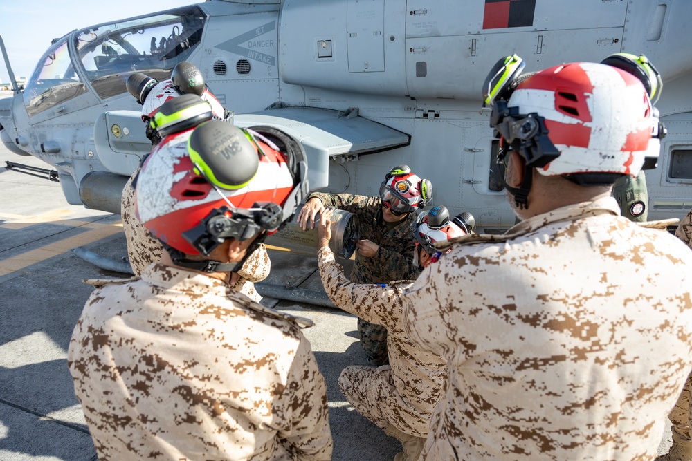 U.S. Marines with HMLA-167 welcome Royal Bahraini Air Force personnel