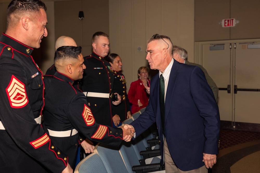 Former Marine Security Guards are awarded by the Sergeant Major of the Marine Corps