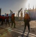 USS Abraham Lincoln conducts ammunition transfer with USNS Washington Chambers