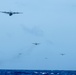 Multinational aircrews drop practice bundles during OCD24 interfly