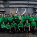 Abraham Lincoln’s catapult crew poses on the flight deck