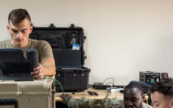 332nd Expeditionary Communications Squadron Radio Shop demonstrates satellite capabilities
