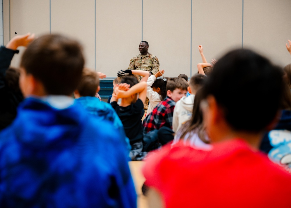 Col. Galbert reads to Freedom Elementary students