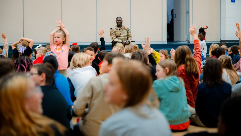 Col. Galbert reads to Freedom Elementary students