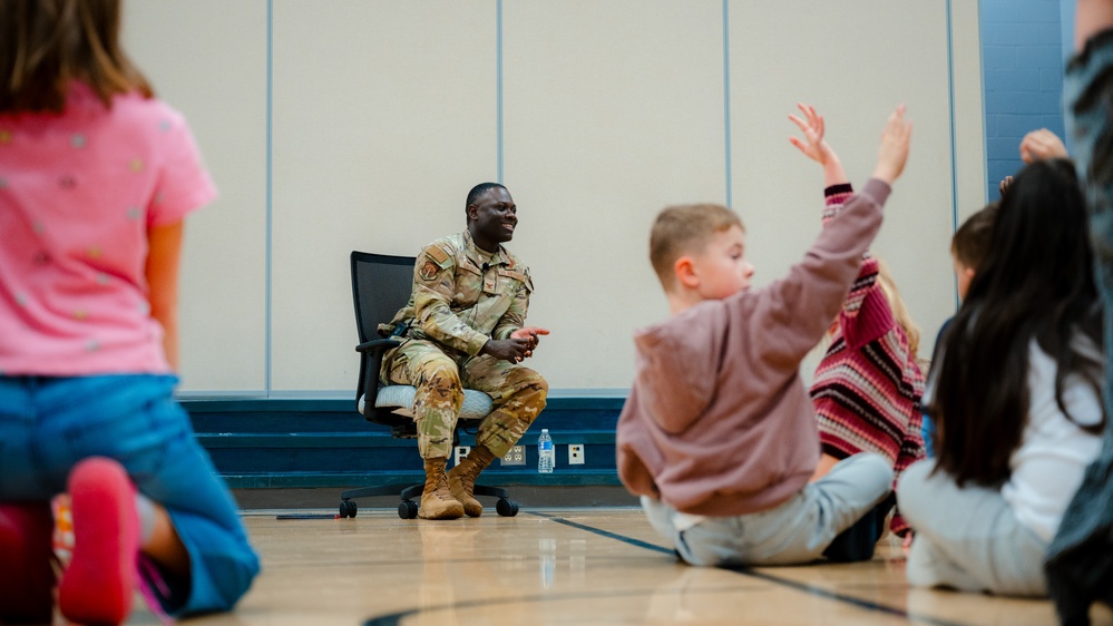 Col. Galbert reads to Freedom Elementary students