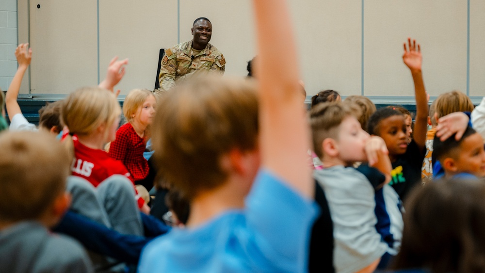 Col. Galbert reads to Freedom Elementary students