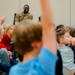 Col. Galbert reads to Freedom Elementary students