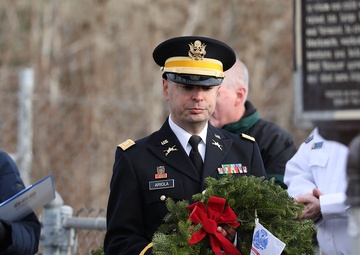 Army Reserve Soldiers lay wreaths for veterans dating back to the Revolutionary War