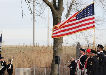 Army Reserve Soldiers lay wreaths for veterans dating back to the Revolutionary War