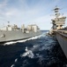 USS Abraham Lincoln conducts ammunition transfer with USNS Washington Chambers