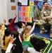 Womack Soldiers Share Holiday Stories with Children