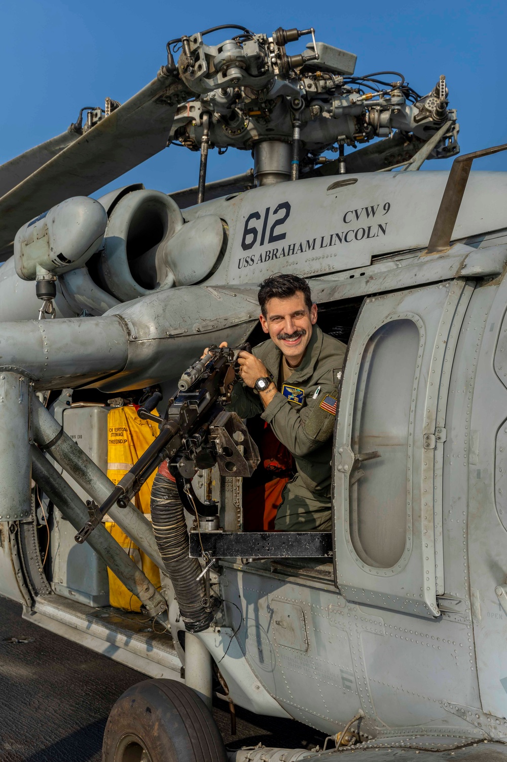 Commanding officer of Helicopter Sea Combat Squadron (HSC) 14 poses for an environmental portrait