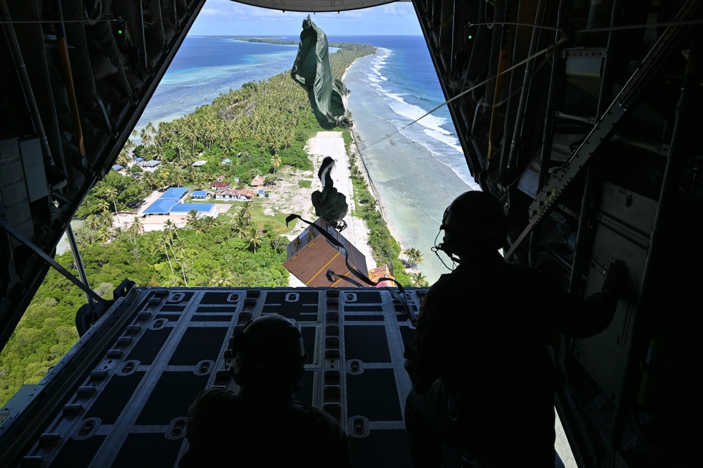 Continuing The Legacy: Gold Star Spouse Participates in Operation Christmas Drop