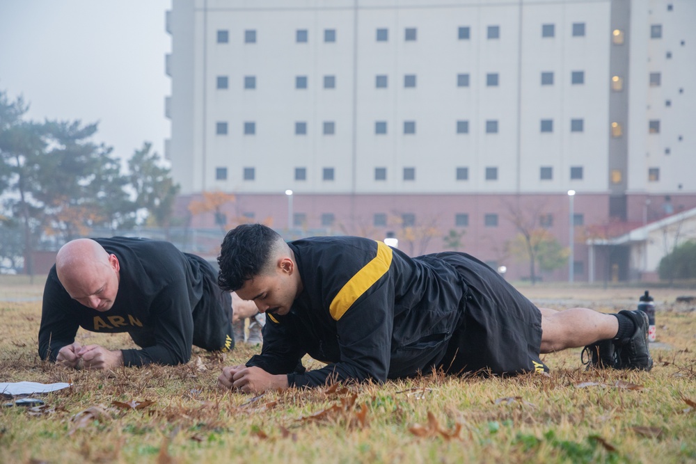 U.S. Army Soldiers perform the timed plank event during ACFT at Camp Humphreys, South Korea, Nov 2024. U.S. Army photo by Pfc. Michelle Lessard.