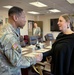 DoDEA Director Dr. Beth Schiavino-Narvaez coined by Maj. Gen. Daryl Hood