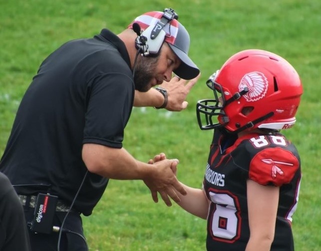 DCSA Family Impacts PA Community with Coaching, Cheering and the Game of Football